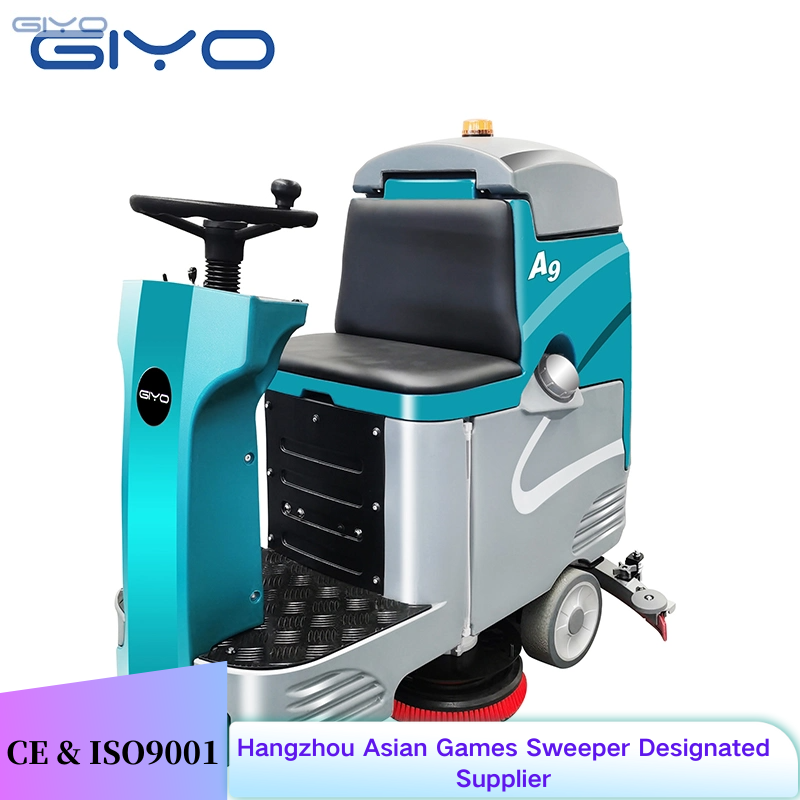Industrial riding floor scrubber cleaning a large warehouse
